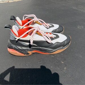 Puma Chunky Black & White Athletic Sneakers with Orange Accents